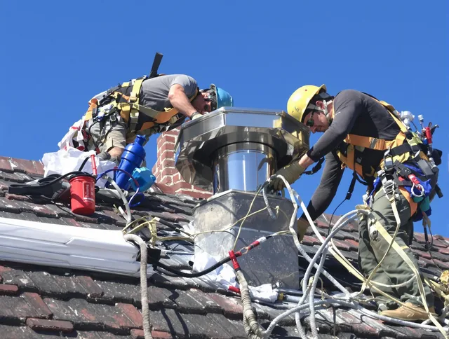 Protective chimney cap installed by Northbridge Chimney Sweep in Northbridge, MA